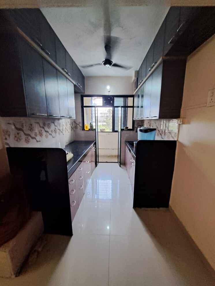 Kitchen, maruti-mahadev-nagar 2 Bedroom 975 Sq.Ft. Apartment In Sunil Nagar Thane 7818393