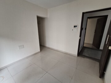 Living Room in 1 BHK Apartment at Ekdant Anmol Oasis, Naupada – for Sale