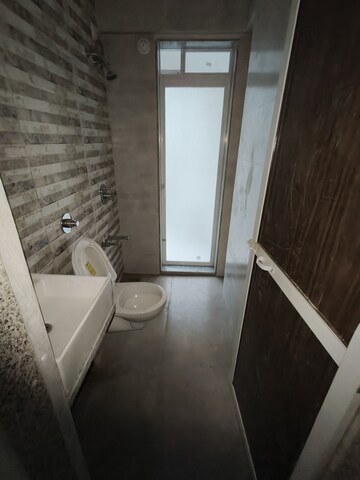 Bathroom in 1 BHK Apartment at Ekdant Anmol Oasis, Naupada – for Sale