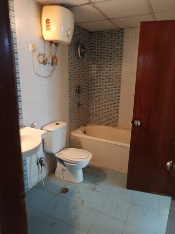 Bathroom in 3 BHK Apartment at Omaxe Grand, Sector 93b – for Sale