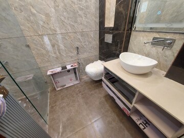 Bathroom in 3 BHK Apartment at Amolik Aster Woods, Sector 98 – for Sale