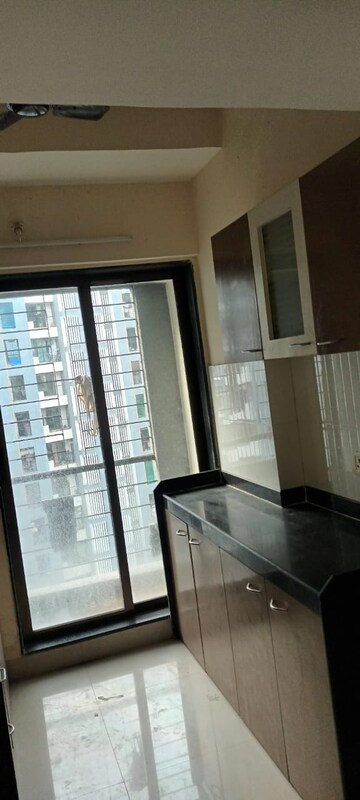 Kitchen in 1 BHK Apartment at Ekta Parksville Brooklyn Park, Virar West – for Sale