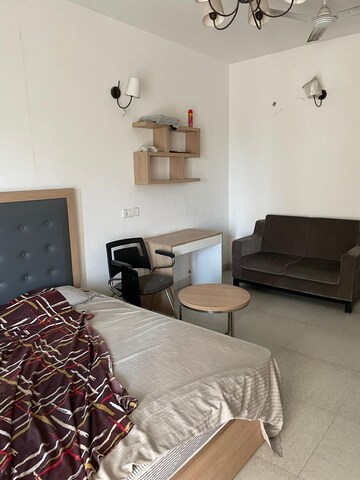 Living Room in Studio Apartment at Nimbus The Golden Palm, Sector 168 – for Sale