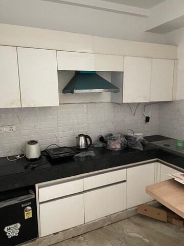 Kitchen in Studio Apartment at Nimbus The Golden Palm, Sector 168 – for Sale