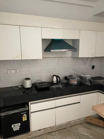 Kitchen in Studio Apartment at Nimbus The Golden Palm, Sector 168 – for Sale
