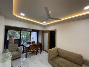 Living Room in 2.5 BHK Apartment at Oberoi Springs, Andheri West – for Sale