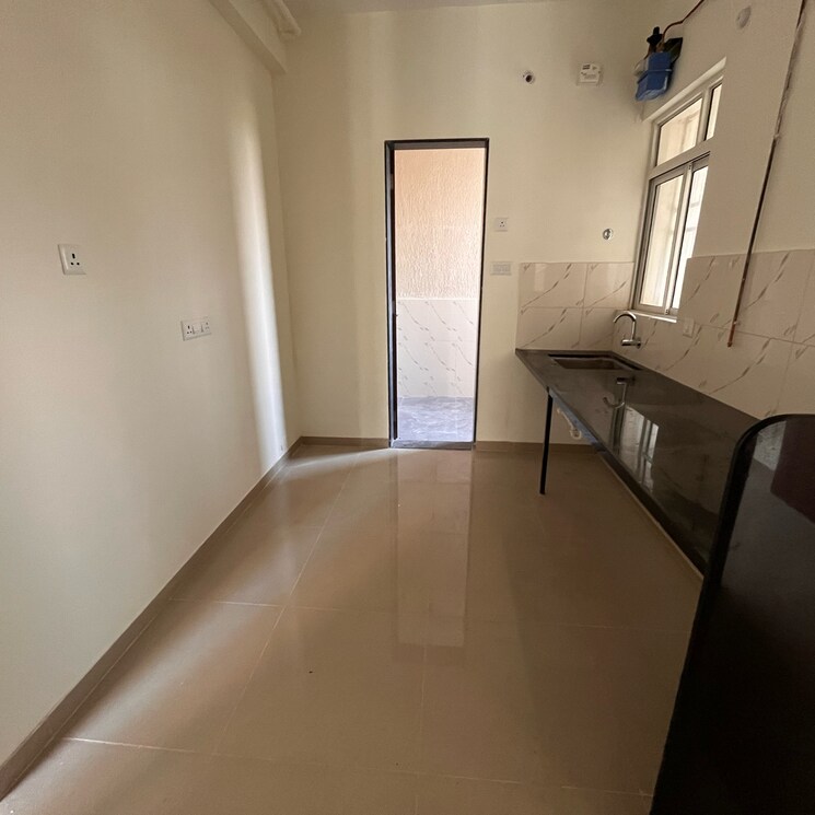 Kitchen, kolte-patil-life-republic-16th-avenue-arezo 2 Bedroom 750 Sq.Ft. Apartment In Marunji Pune 7820064