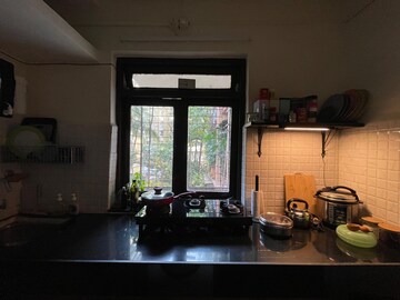 Living Room in 1 BHK Apartment at Juhu – for Rent