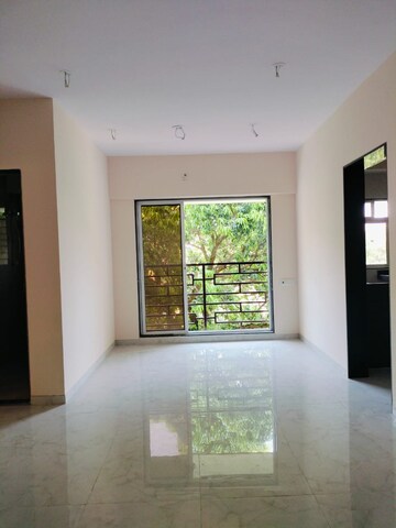 Living Room in 3 BHK Apartment at Kamal Niwas Dahisar, Dahisar West – for Sale