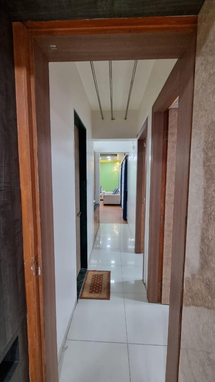 Living Room, karan-sara 2 Bedroom 875 Sq.Ft. Apartment In Baner Pune 7821141