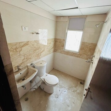 Bathroom in 3 BHK Apartment at Amrapali Golf Homes, Haibatpur – for Sale