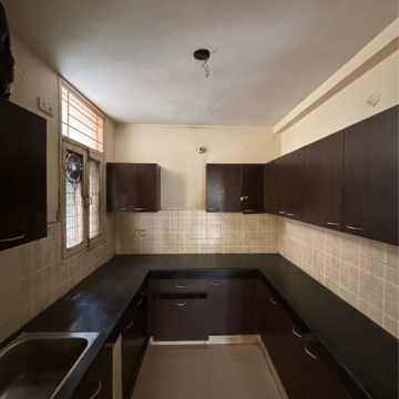 Kitchen in 2 BHK Apartment at Dhakoli Village – for Sale