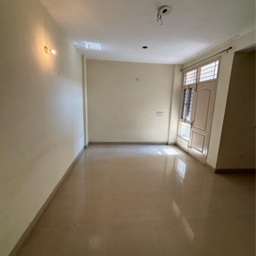 Living Room in 2 BHK Apartment at Dhakoli Village – for Sale