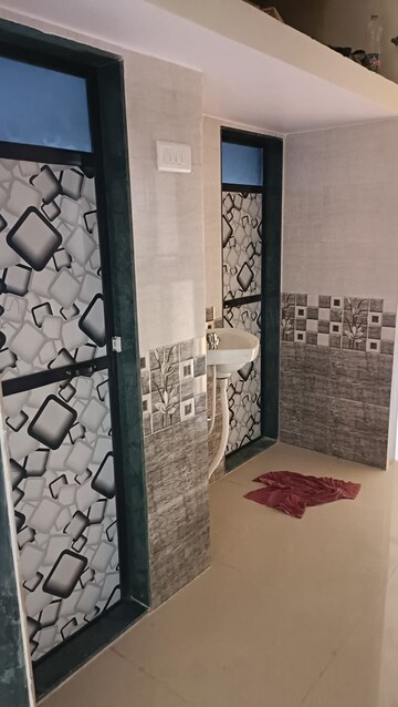 Living Room in 1 BHK Apartment at Raj Dharm CHS, Dombivli West – for Sale
