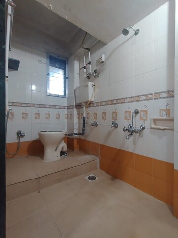 Bathroom in 1 BHK Apartment at Kishor Sukur Enclave A, Ghodbunder Road – for Sale