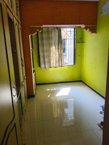 Living Room in 1 BHK Apartment at Guru Vihar Complex CHS, Kalamboli – for Sale