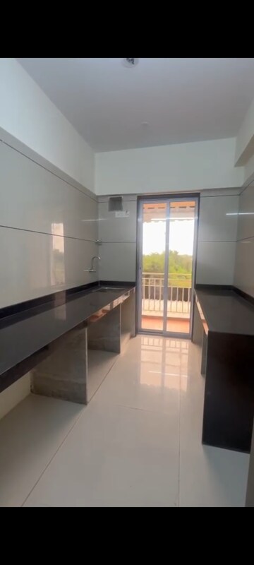 Kitchen in 1 BHK Apartment at Ritu Gardenia, Naigaon East – for Sale