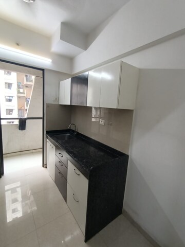 Kitchen in 1 BHK Apartment at Lodha Palava City Lakeshore Greens, Dombivli East – for Rent