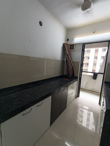 Kitchen in 1 BHK Apartment at Lodha Palava City Lakeshore Greens, Dombivli East – for Rent