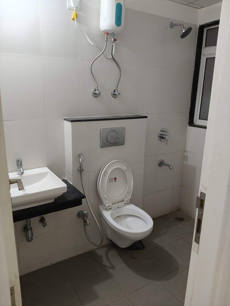 Bathroom, godrej-greens 2 Bedroom 563 Sq.Ft. Apartment In Undri Pune 7823860
