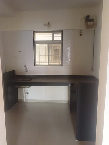 Kitchen in 2 BHK Apartment at Amit Astonia Classic, Undri – for Sale