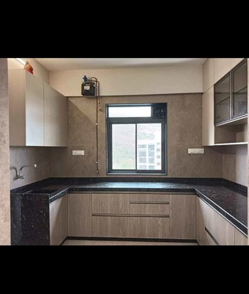 Kitchen in 1 BHK Apartment at Metro Satyam Queens Necklace, Kharghar – for Sale
