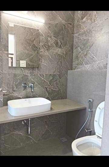 Bathroom in 1 BHK Apartment at Metro Satyam Queens Necklace, Kharghar – for Sale