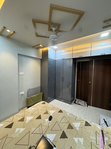 Master Bedroom in 1 BHK Apartment at Raj Rudraksha, Dahisar East – for Sale