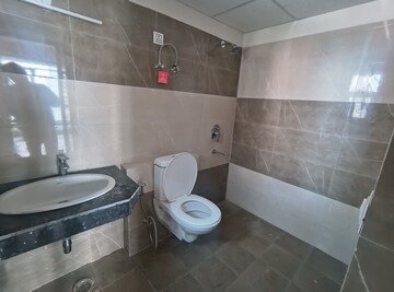 Bathroom in 1 BHK Apartment at Cosmos Express 99, Sector 99 – for Sale