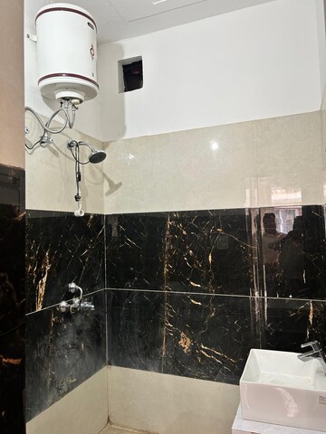 Bathroom in 3 BHK Builder Floor at Dhakoli Village – for Sale