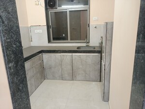 Kitchen in 2 BHK Apartment at Runwal Eirene, Balkum Pada – for Rent