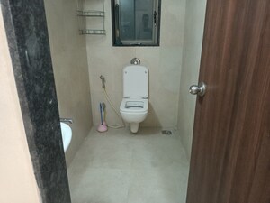 Bathroom in 2 BHK Apartment at Runwal Eirene, Balkum Pada – for Rent