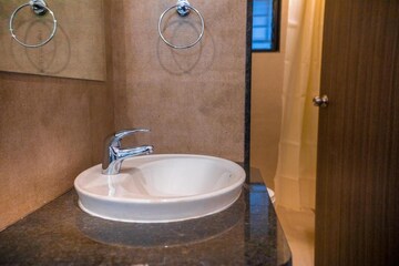 Bathroom in Studio Apartment at Saarrthi Skybizz, Mahalunge – for Sale