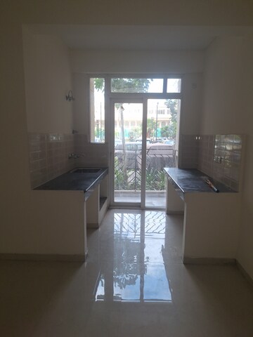 Kitchen in 2 BHK Apartment at Signature Global Grand Iva, Sector 103 – for Sale