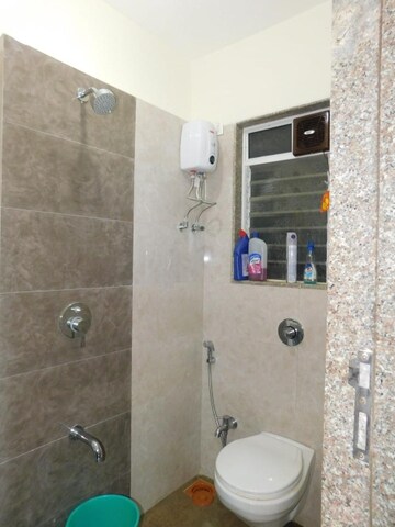 Bathroom in 1 BHK Apartment at Om Saath Grandness, Dahisar East – for Sale