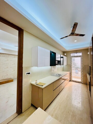 Kitchen in 3.5 BHK Builder Floor at Ansal API Esencia, Sector 67 – for Sale