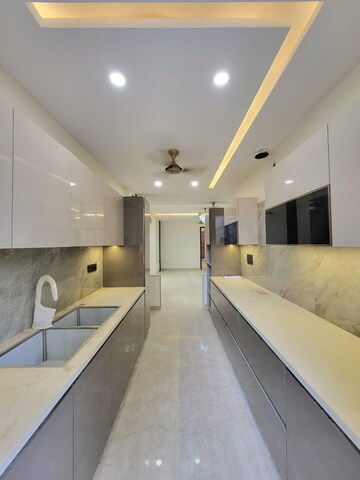 Kitchen in 3 BHK Builder Floor at Unitech Palms, South City 1 – for Sale