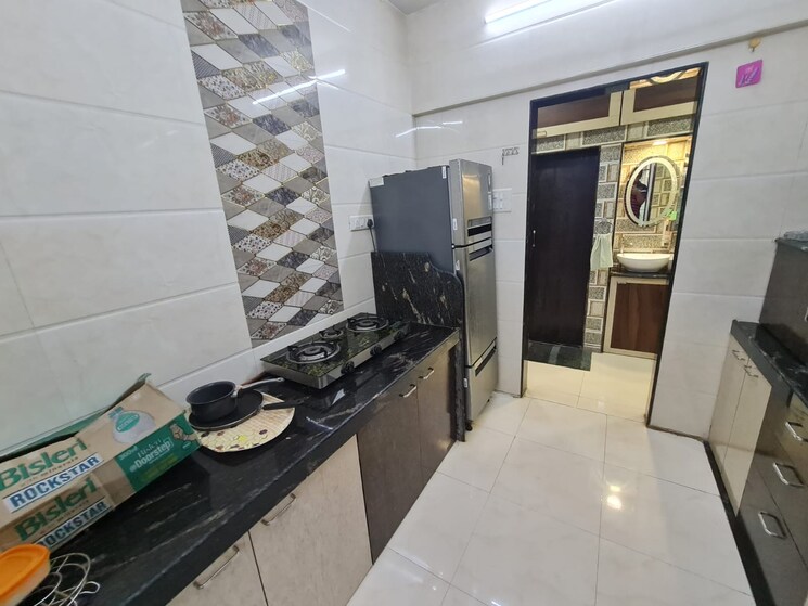 Kitchen, eden-rose-3 1 Bedroom 550 Sq.Ft. Apartment In Mira Road Thane 7827171
