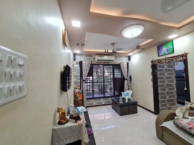 Living Room, eden-rose-3 1 Bedroom 550 Sq.Ft. Apartment In Mira Road Thane 7827171