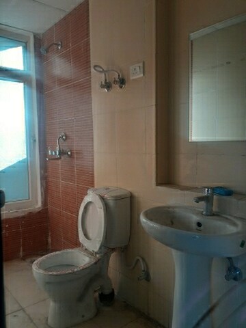 Bathroom in 3 BHK Apartment at Mahagun Mywoods, Sector 16c Greater Noida – for Sale