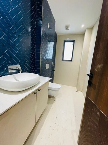 Bathroom in 4 BHK Builder Floor at Ansal API Esencia, Sector 67 – for Sale