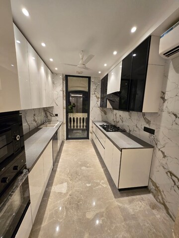 Kitchen in 4 BHK Builder Floor at Ansal API Esencia, Sector 67 – for Sale