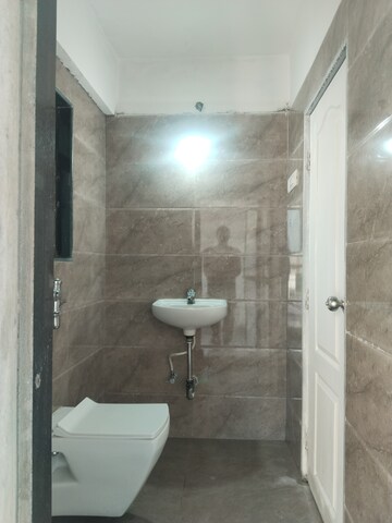 Bathroom in 2 BHK Apartment at Gagangiri Northern Star, Dahisar West – for Sale