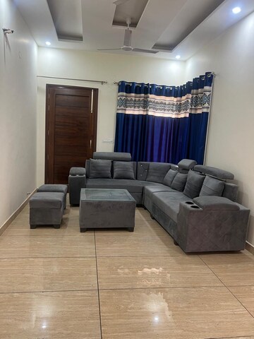 Living Room in 4 BHK Apartment at DLF Beverly Park I, Sector 28 – for Sale