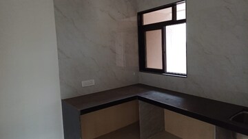Kitchen in 2 BHK Apartment at Naupada – for Sale