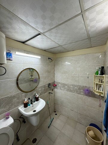Bathroom in 3 BHK Apartment at Amrapali Silicon City, Sector 76 – for Sale