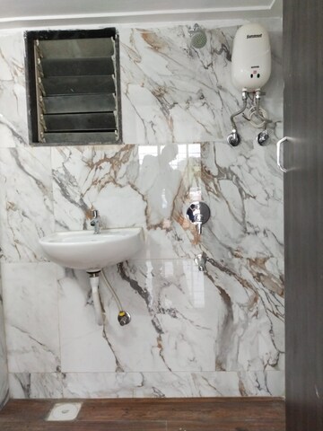 Bathroom in 1 BHK Apartment at RNA NG Shree Ram Van, Vasai East – for Sale