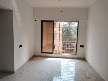 Living Room in 1 BHK Apartment at Dahisar East – for Sale