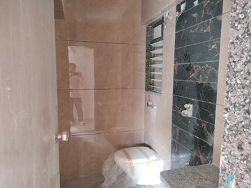 Bathroom in 1 BHK Apartment at Dahisar East – for Sale