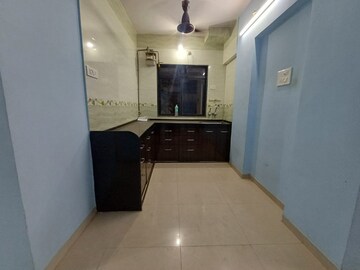 Kitchen in 1 BHK Apartment at Ek Siddhi CHS Kolbad Road, Khopat – for Sale